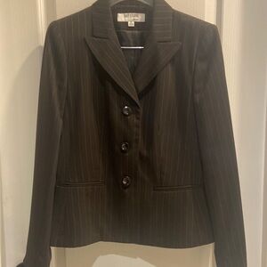 2 piece pant suit. Dark brown pin stripe. Very well taken care of.